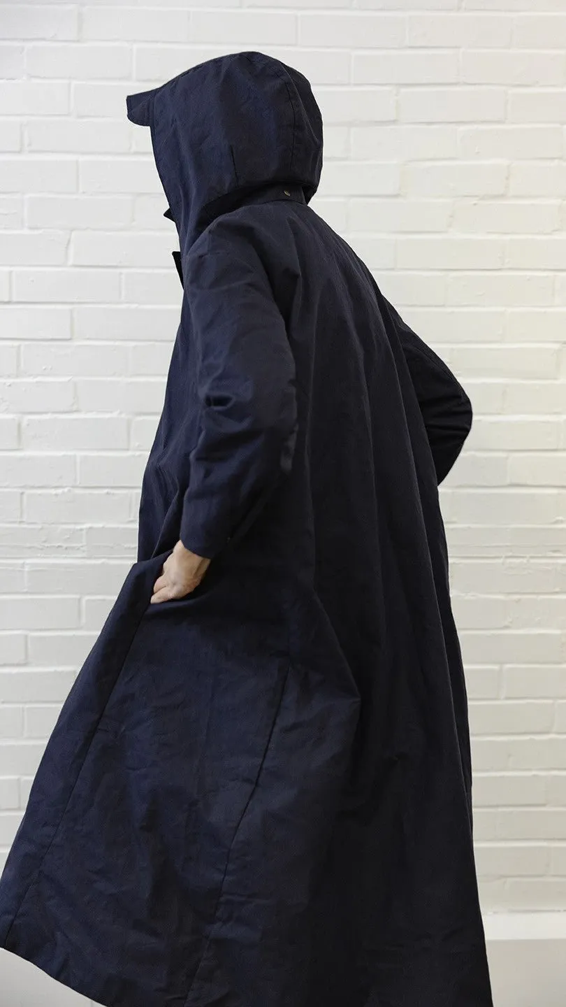 Waxed Cotton Asymmetric Raincoat in Navy by Lora Gene